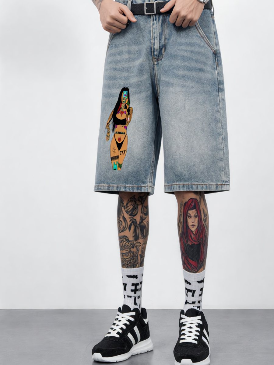 Close-up of the washed denim shorts with the tattooed-woman graphic